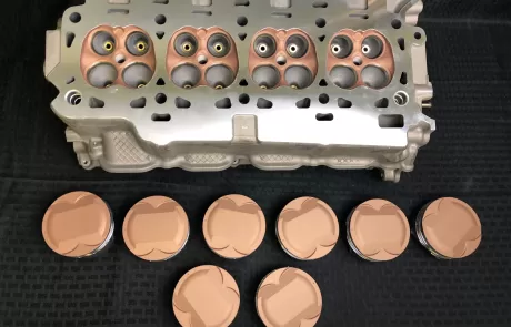 Heads and pistons coated by IA Coatings